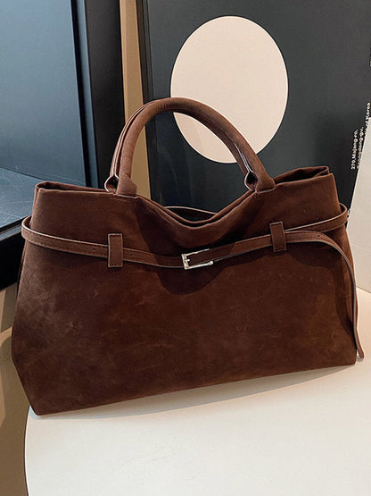 Handtasche in Wildlederoptik
