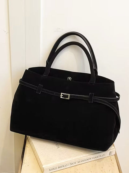 Handtasche in Wildlederoptik